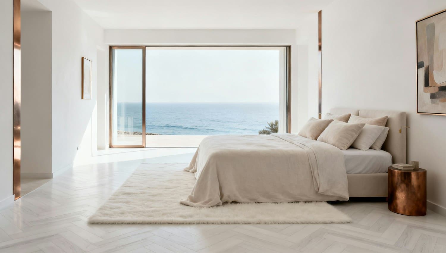 Calm guest room with a linen bed and sea view through tall glass doors